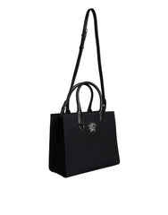 Bolso tote cruzado Versace de lona y cuero con asa superior en color negro y logotipo