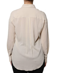 Blusa con cuello y botones en mezcla de seda beige de Brunello Cucinelli