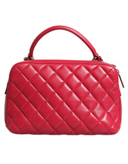 Bolso de piel de cordero con cadena CC y sello rosa de Chanel