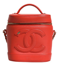 Bolso de mano con cadena y diseño de coco naranja de Chanel