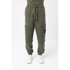 Pantalones de algodón verde Stone Island para hombre
