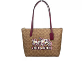 Bolso tote Fiona de lona con cremallera de la firma de COACH, color marrón
