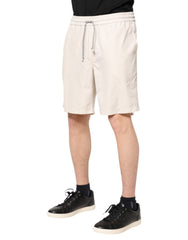 Bermudas Brunello Cucinelli con logo en blanco roto para hombre