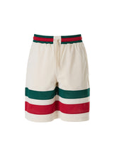 Pantalones cortos de poliéster con logotipo de Gucci en color crema