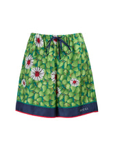 Pantalones cortos de seda con estampado de flores verdes de Gucci