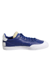 Zapatillas Nike blancas y azules con cordones y caña baja tipo drop-type PRM