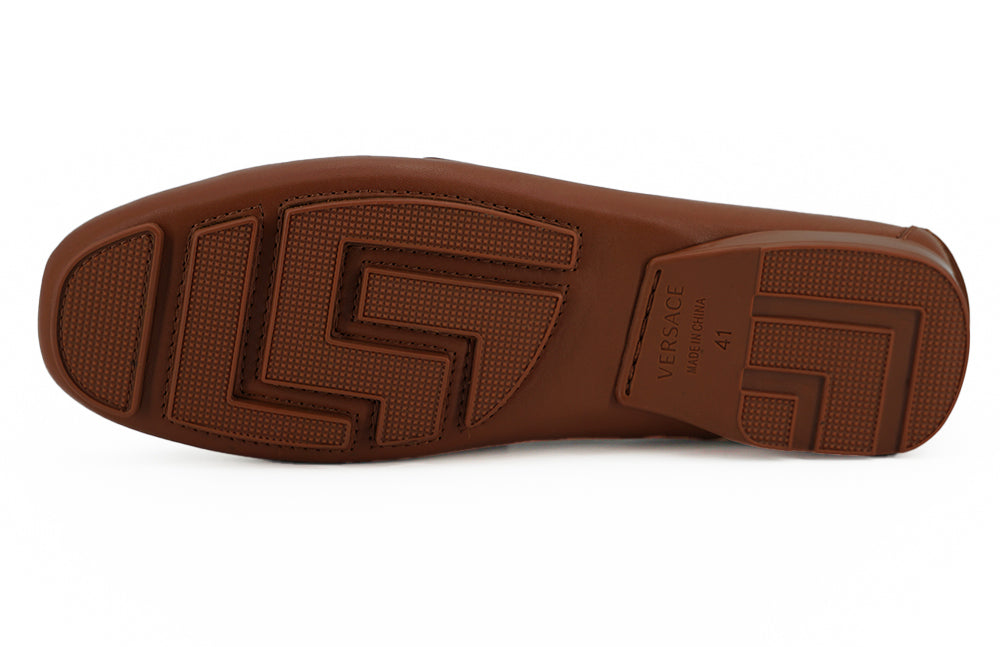 Mocasines elegantes de piel con relieve de Medusa de Versace
