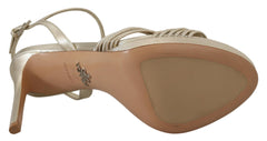 Sandalias elegantes de tacón de aguja dorado de Prada