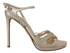 Sandalias elegantes de tacón de aguja dorado de Prada