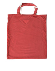 Bolso tote elegante de tela roja y blanca de Prada