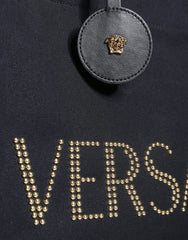 Bolso tote cruzado Versace de lona y cuero con asa superior en color negro y logotipo