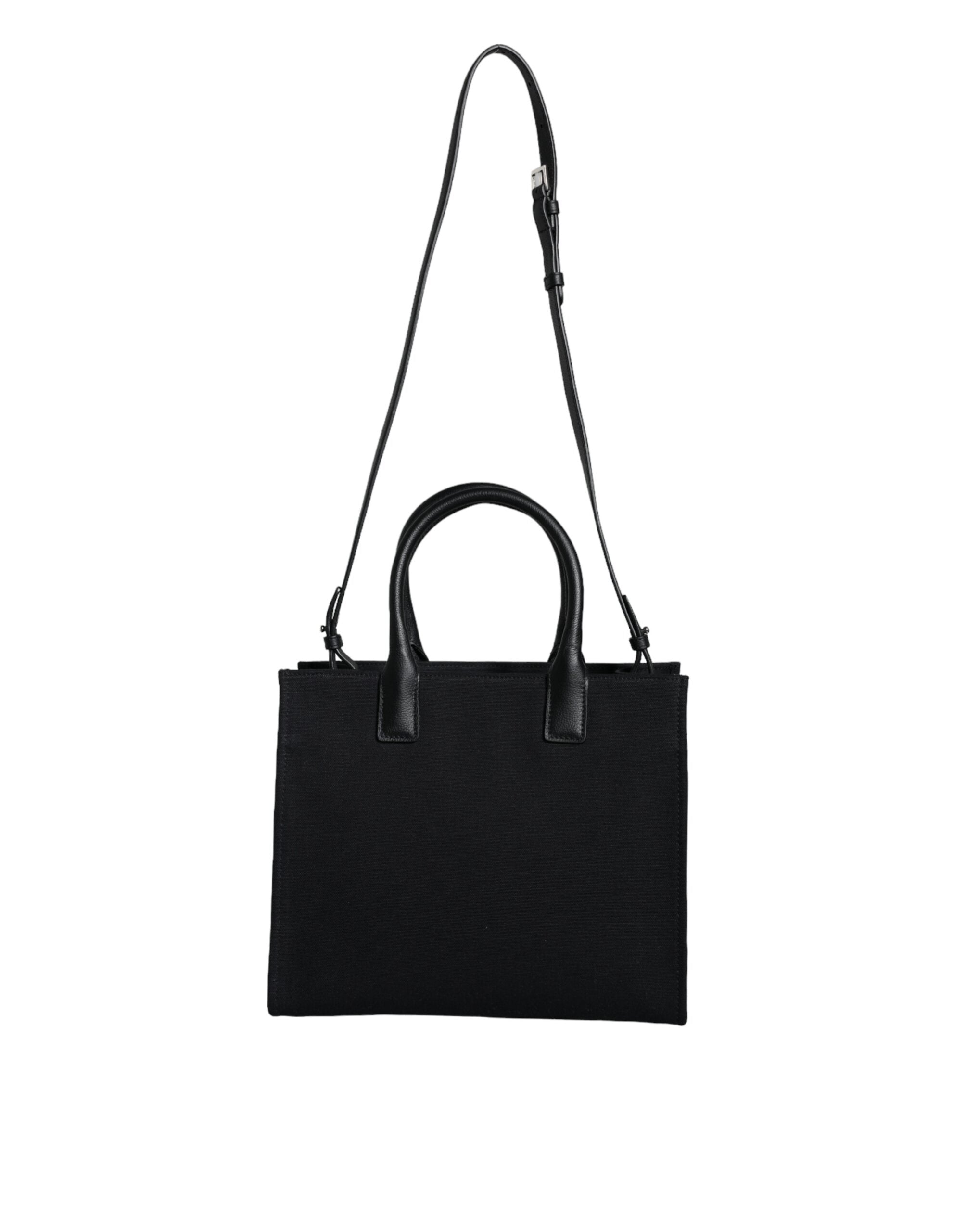 Bolso tote cruzado Versace de lona y cuero con asa superior en color negro y logotipo