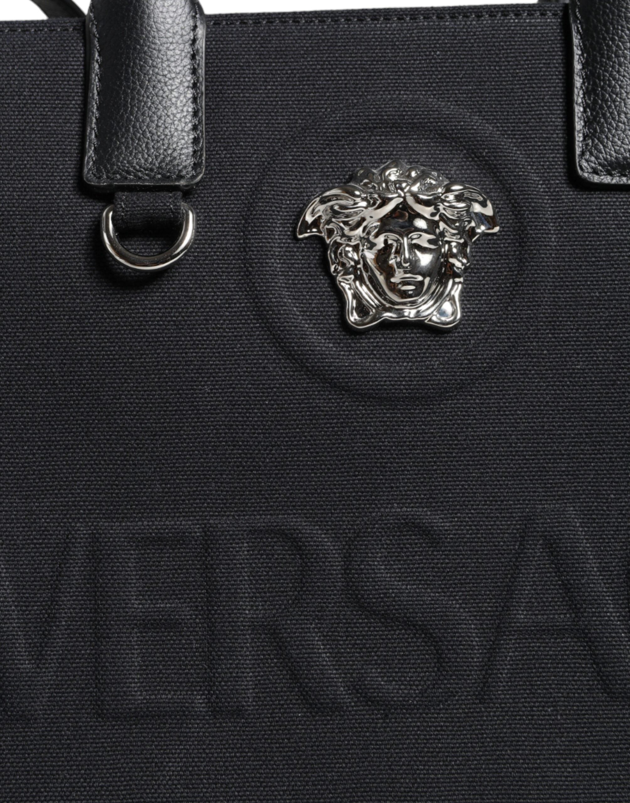 Bolso tote cruzado Versace de lona y cuero con asa superior en color negro y logotipo