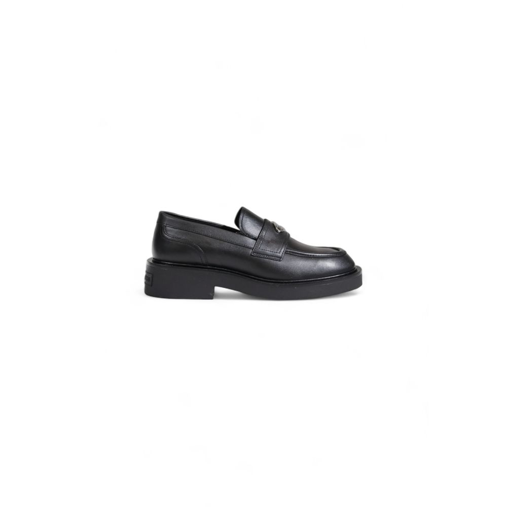 Zapatos planos de cuero negro de Tommy Hilfiger