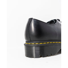 Zapatos Oxford y Derby de cuero negro de Dr. Martens