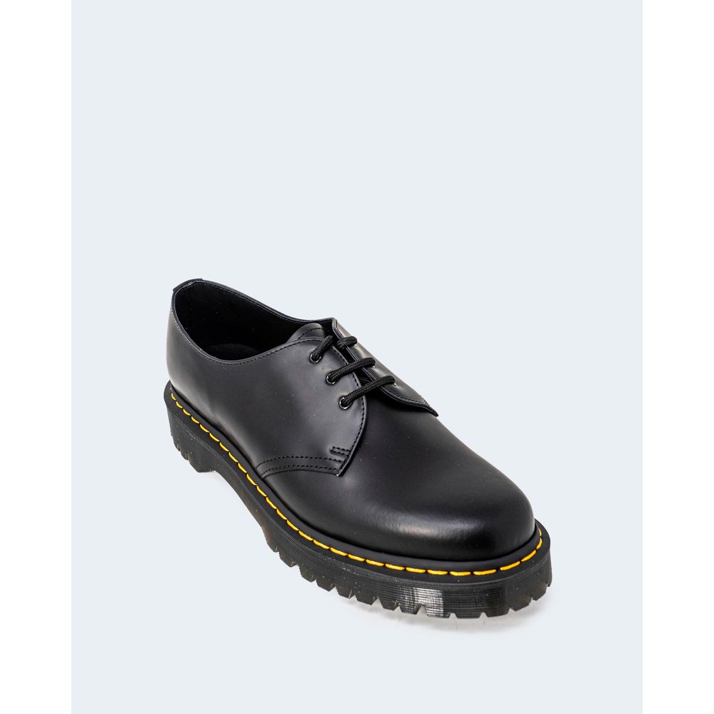 Zapatos Oxford y Derby de cuero negro de Dr. Martens