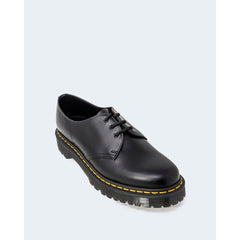 Zapatos Oxford y Derby de cuero negro de Dr. Martens