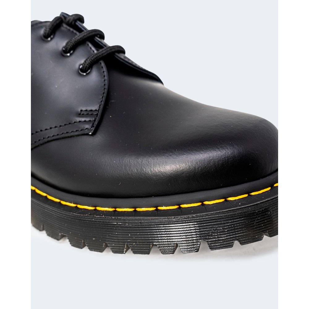 Zapatos Oxford y Derby de cuero negro de Dr. Martens