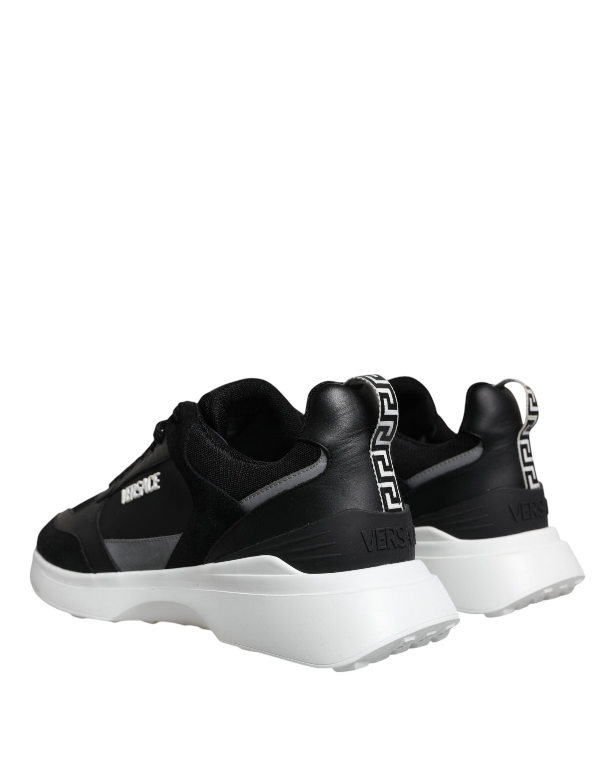 Zapatillas bajas Versace de lona negra con tejido cuádruple Medusa
