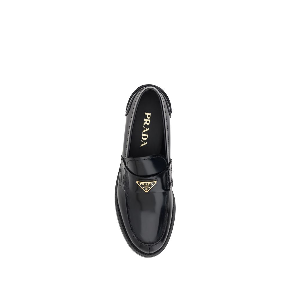 Mocasines de cuero negro con logotipo de Prada