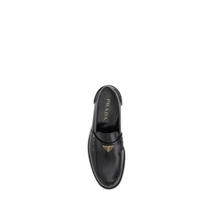 Mocasines con placa triangular de Prada
