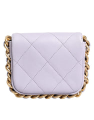 Mini bolso bandolera Chanel de piel de becerro acolchada azul con solapa y cadena