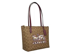 Bolso tote Fiona de lona con cremallera de la firma de COACH, color marrón