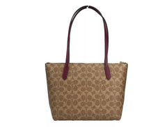 Bolso tote Fiona de lona con cremallera de la firma de COACH, color marrón