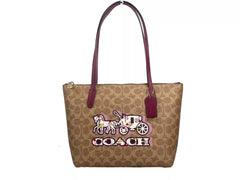 Bolso tote Fiona de lona con cremallera de la firma de COACH, color marrón