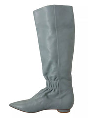 Botas altas hasta la rodilla con tacón de aguja y tacón plano elástico de cuero azul de Valentino