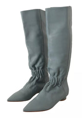 Botas altas hasta la rodilla con tacón de aguja y tacón plano elástico de cuero azul de Valentino