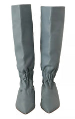 Botas altas hasta la rodilla con tacón de aguja y tacón plano elástico de cuero azul de Valentino