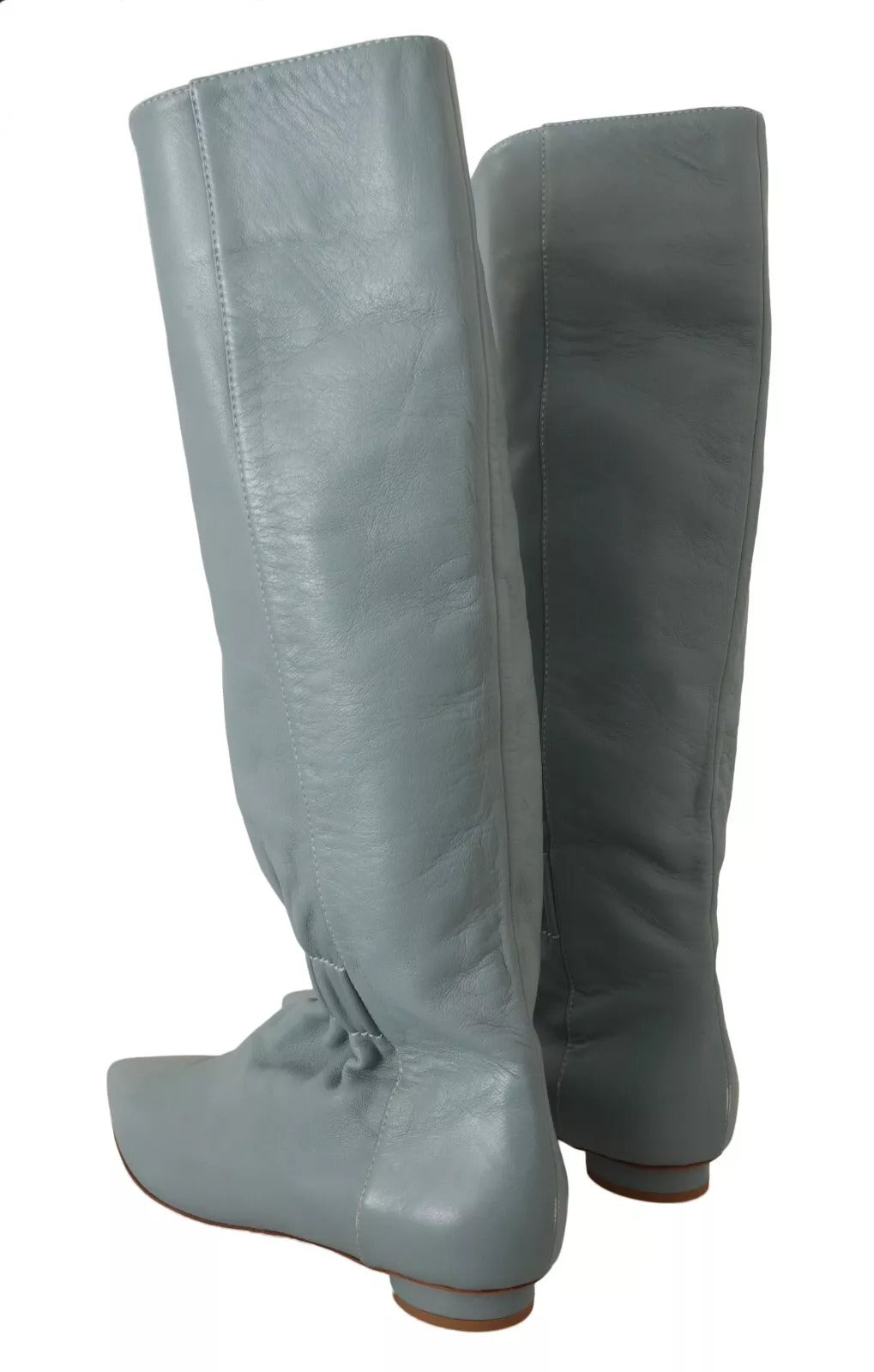 Botas altas hasta la rodilla con tacón de aguja y tacón plano elástico de cuero azul de Valentino