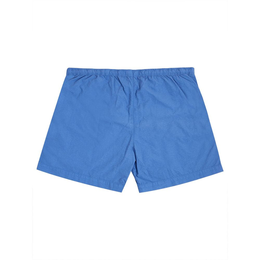 Trajes de baño azules elegantes de CP Company para el hombre moderno