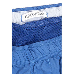 Trajes de baño azules elegantes de CP Company para el hombre moderno
