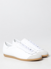 Zapatillas bajas de piel y ante con diseño de plumas de Maison Margiela