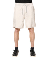 Bermudas Brunello Cucinelli con logo en blanco roto para hombre
