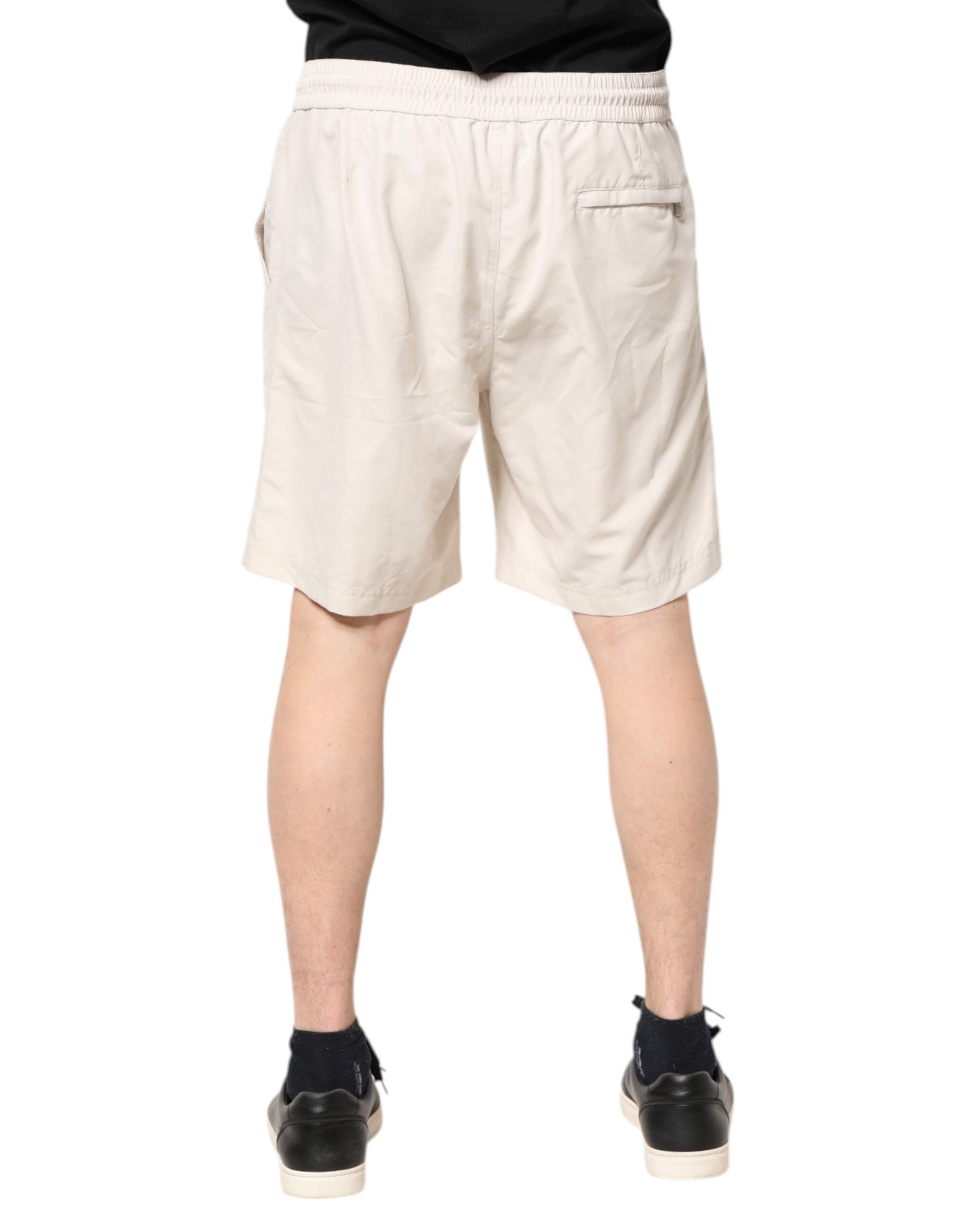 Bermudas Brunello Cucinelli con logo en blanco roto para hombre