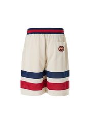 Pantalones cortos de poliéster con logotipo de Gucci en color crema