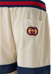 Pantalones cortos de poliéster con logotipo de Gucci en color crema