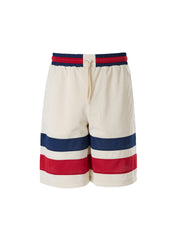 Pantalones cortos de poliéster con logotipo de Gucci en color crema