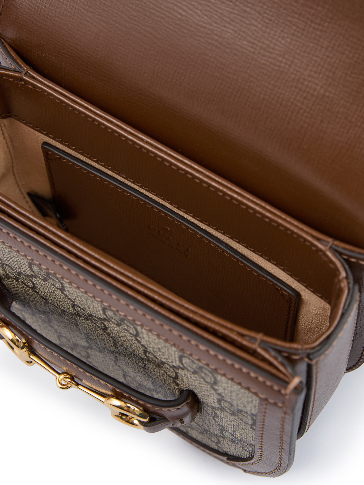 Riñonera Gucci GG con monograma Horsebit 1955 en beige