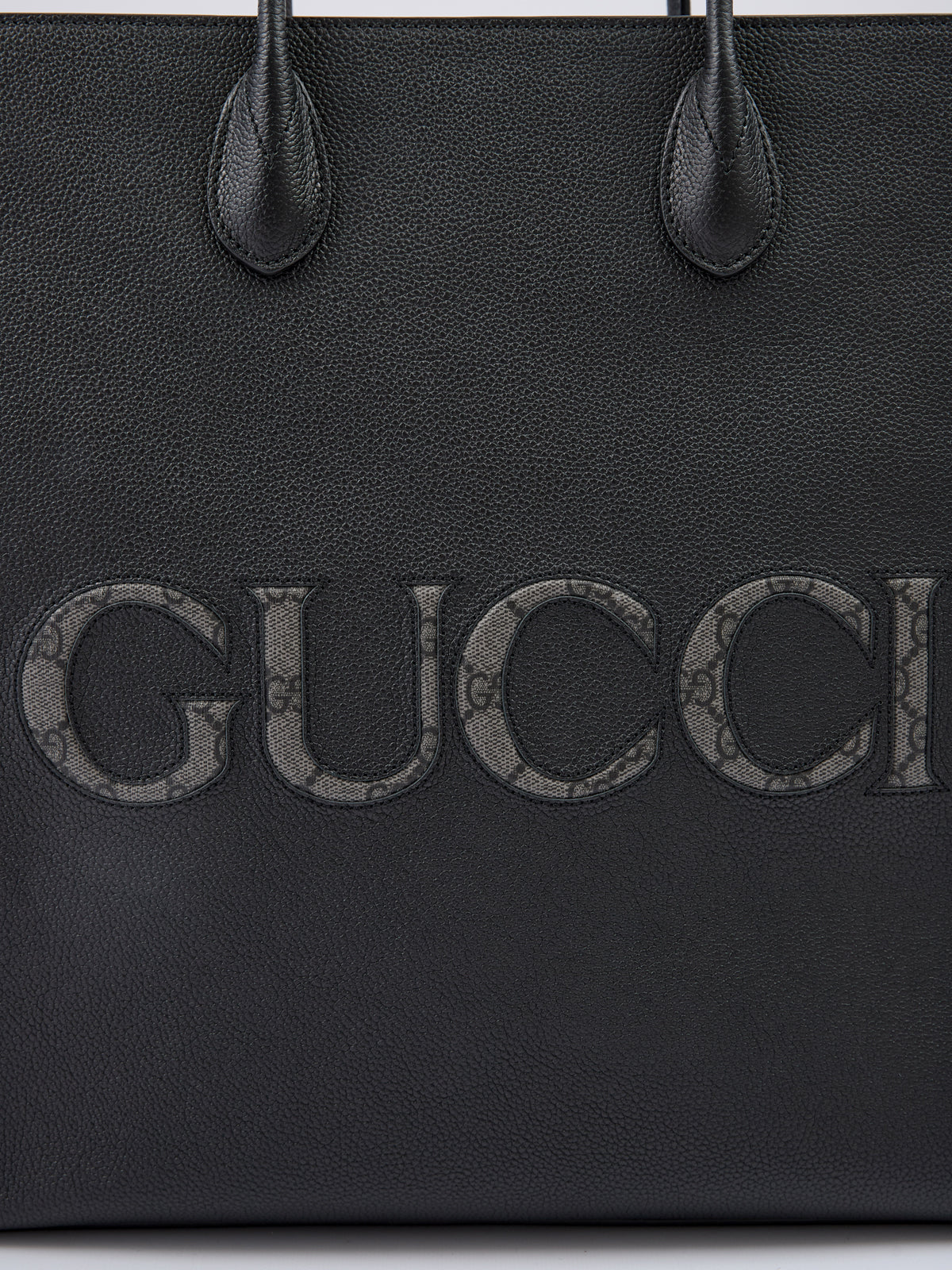 Bolso tote mediano de cuero negro con logotipo de Gucci