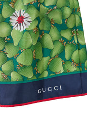 Pantalones cortos de seda con estampado de flores verdes de Gucci