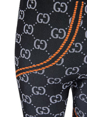 Pantalones leggings con logo integral de poliamida negra Gucci