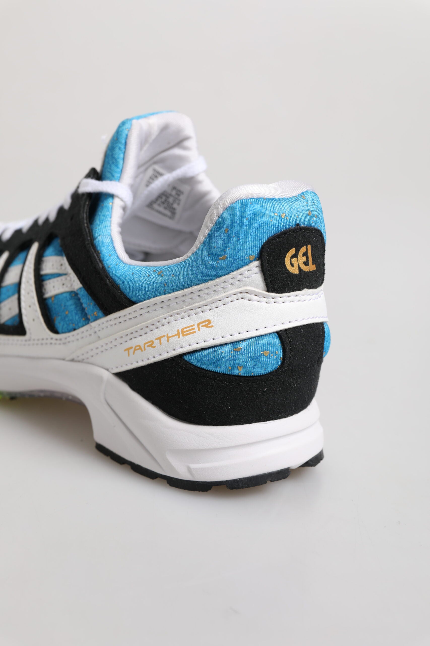 Zapatillas Asics Tarther SD azules y negras