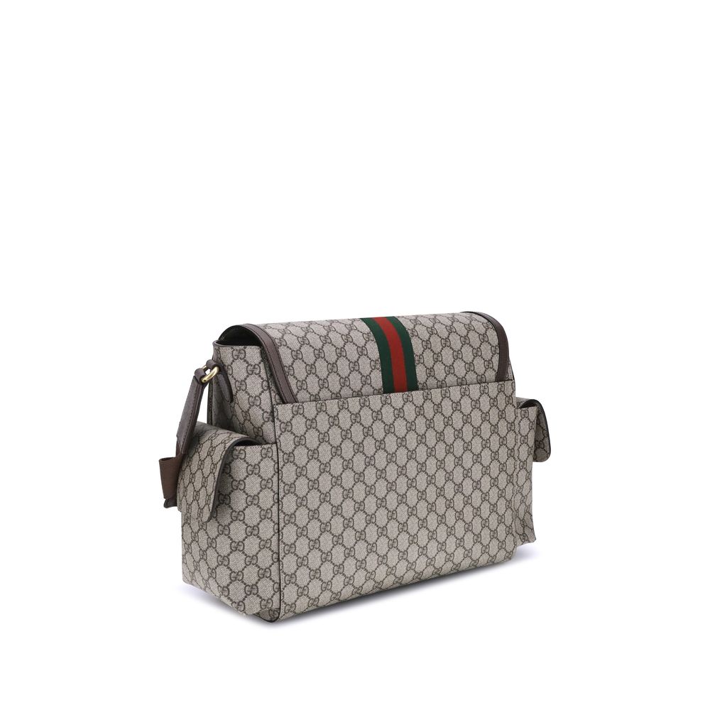 Bolso de hombro con accesorio infantil de Gucci