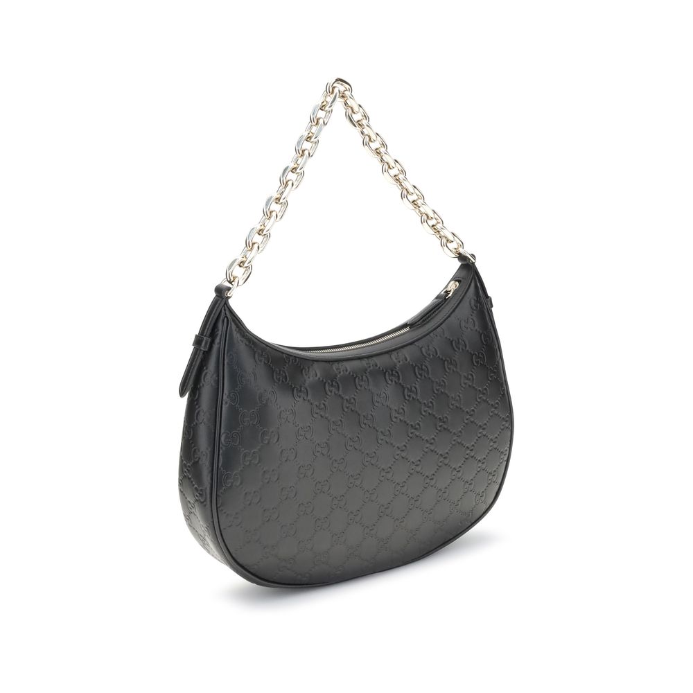 Bolso de hombro con emblema GG de Gucci
